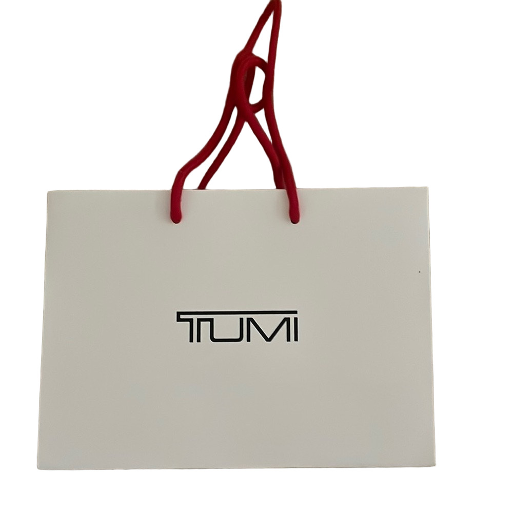 TUMI Small White Bag with Bold Red Handles